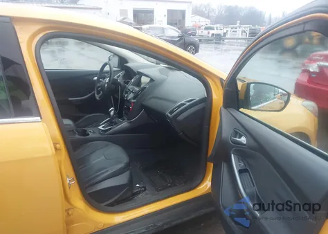 2012 Ford Focus Titanium z USA, uszkodzony, nr VIN 1FAHP3J26CL345722